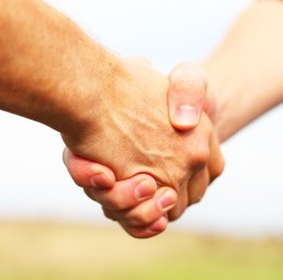 Psychotherapist And Psychotherapy Client Shaking Hands